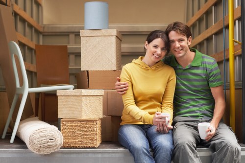 Packed boxes and furniture ready for local house moving in Clapham