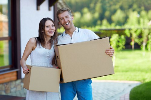 Moving boxes and furniture in a Clapham street with parking considerations