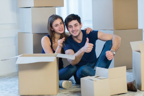 Team handling boxes carefully during a structured move
