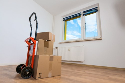 Local movers navigating a Clapham residential street with a moving van