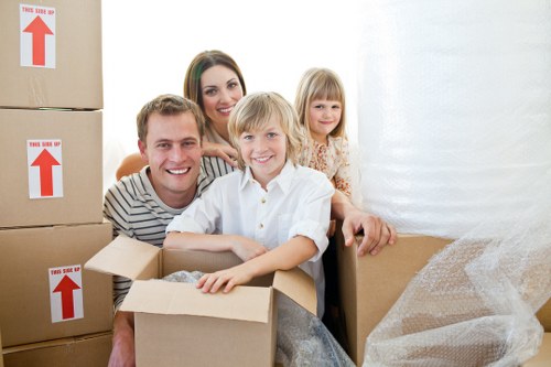 Packed boxes and furniture ready for a house move in Clapham