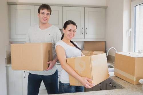 Professional movers loading furniture for a Clapham move