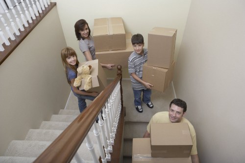 Unpacking boxes and arranging items in a new Clapham property after the move